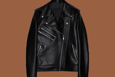 Women’s double‑zipper black leather biker jacket