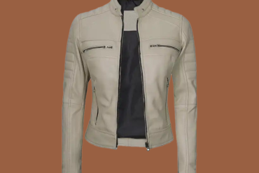 Women’s beige leather cafe‑racer jacket with stand collar and front zip closure — genuine leather outerwear for women.