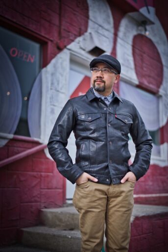 Rugged trucker leather jacket showcasing bold design and timeless appeal