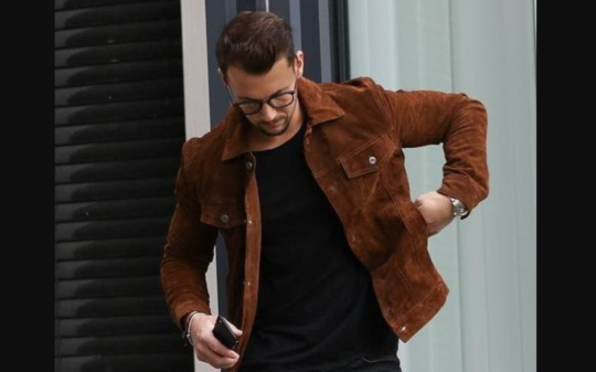 Premium suede leather jacket showcasing timeless design, soft texture, and classic style